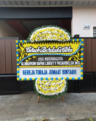 Papan Bunga Duka di Pager